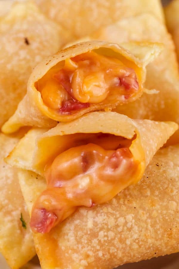 close-up image of a keto pizza roll cut in half