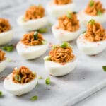 hero shot keto buffalo deviled eggs with chopped green onion