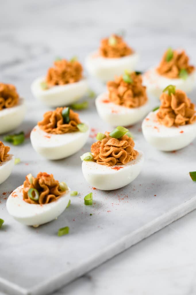 hero shot keto buffalo deviled eggs with chopped green onion