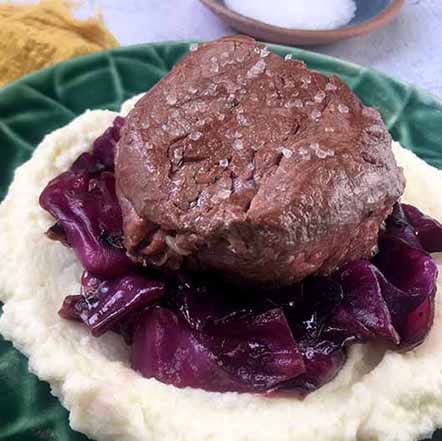 keto steak recipes - a plate of Filet Mignon with Braised Red Cabbage