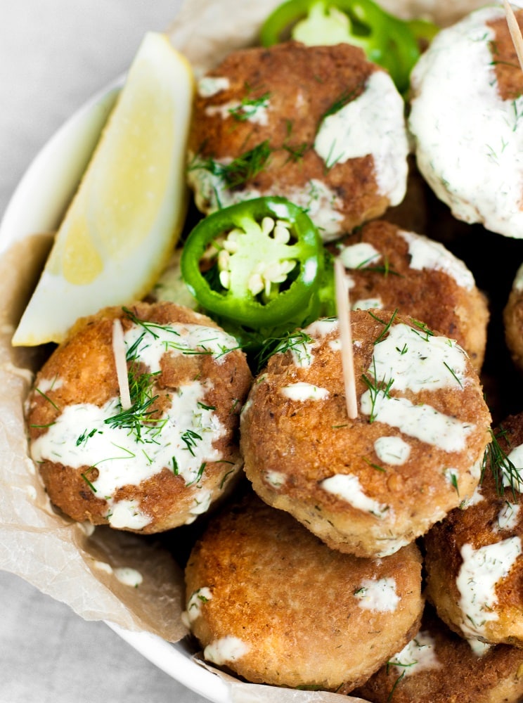 Spicy Salmon Poppers with chili and a lemon wedge