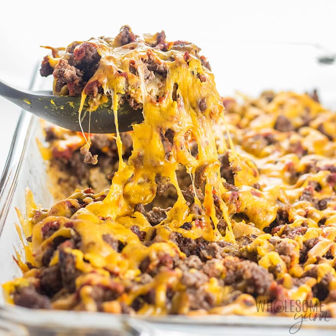 close up image of low carb keto cheeseburger casserole being scooped up