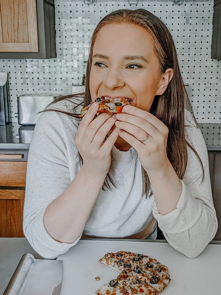 sara nelson of real balanced eating a cooked store-bought keto frozen pizza from Foster Farms