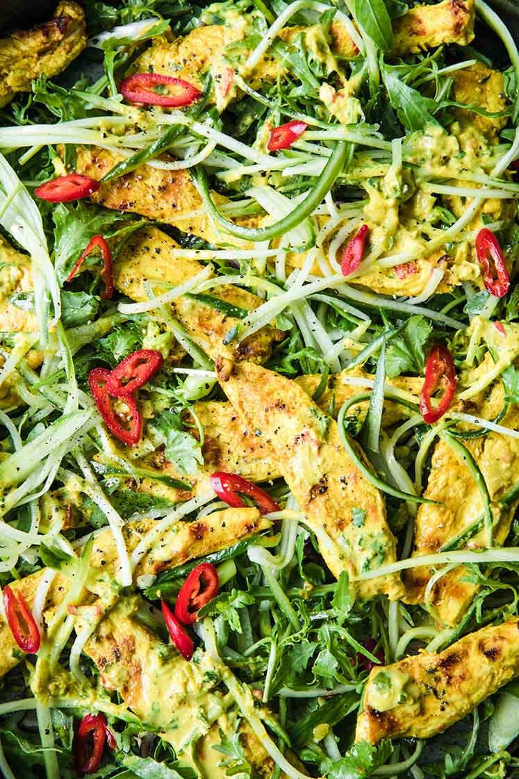 close-up over head image of a pan of thai coconut chicken salad