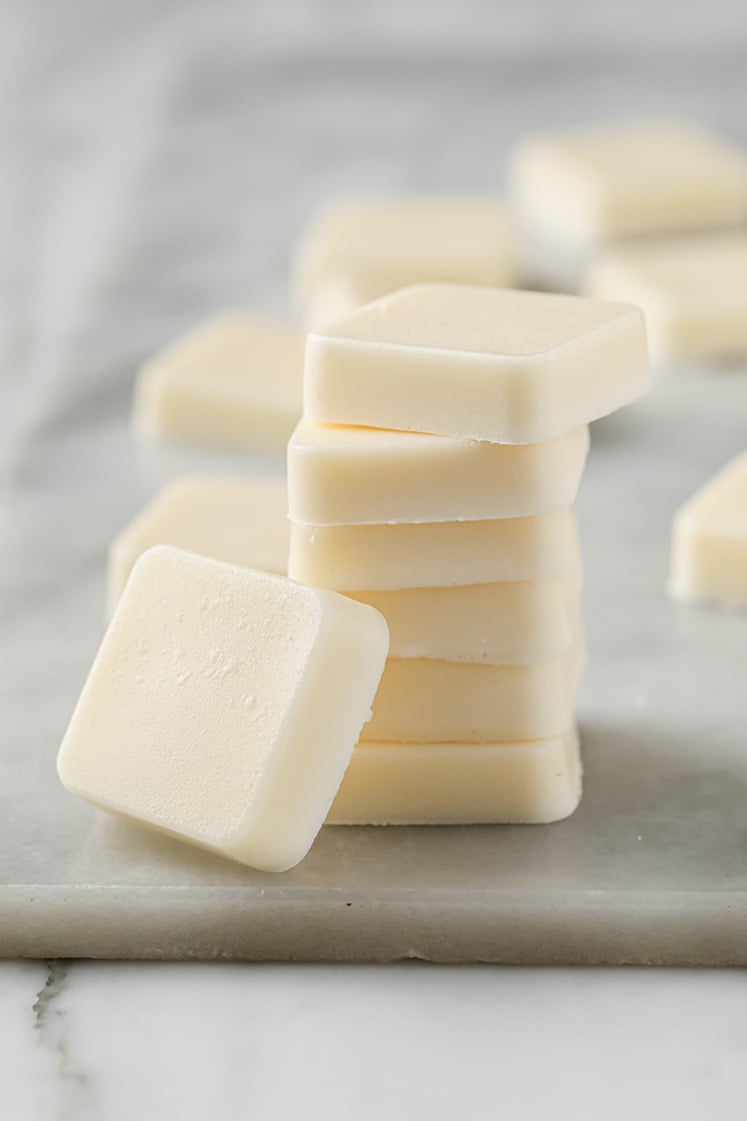 a stack of Marshmallow Fat Bombs resting atop a marble kitchen table