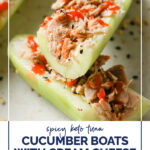 Spicy Keto Tuna Cucumber Boats With Cream Cheese WordPress Pin. The photo shows an angled close-up shot of a spicy keto tuna cucumber boat with cream cheese sliced in half with another cucumber boat on a ceramic plate atop a marble countertop.
