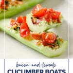 Bacon and Tomato Cucumber Boats WordPress Pin. Photo shows an angled close-up shot of a halved Bacon and Tomato Cucumber Boat and a whole cucumber boat on a ceramic plate atop a marble countertop. Below the photo, there’s text in navy blue letters that say: “Bacon and Tomato Cucumber Boats”. Below the navy blue text, there’s an avocado green text box with white letters that say: “gluten-free · nut-free · coconut-free”. Below the avocado-green text box, there’s text in navy blue letters that say: “realbalanced.com”.