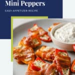 Bacon Wrapped Mini Peppers WordPress Pin. Above the photo, there’s a blue box with text that reads “realbalanced.com,” “Bacon Wrapped Mini Peppers,” and “Easy Appetizer Recipe.” Below the box, the photo shows the Bacon Wrapped Mini Peppers on a plate with a bowl of the Everything Bagel Dip.