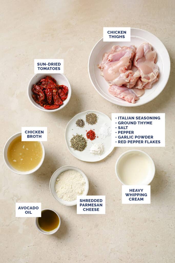Labeled ingredients that are needed to make the Creamy Sun Dried Tomato Chicken recipe.