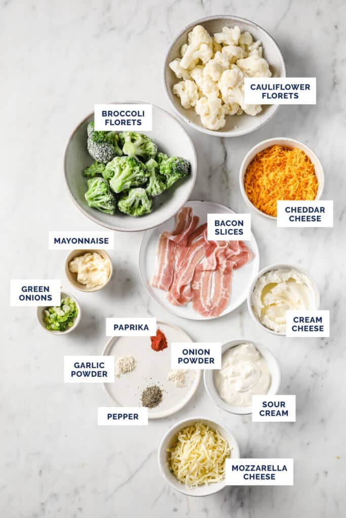 Labeled ingredients needed to make broccoli cauliflower casserole.