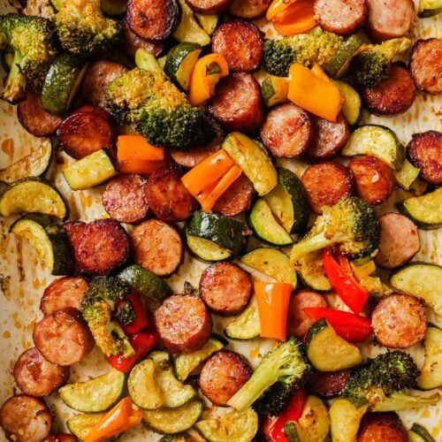 A large sheet pan with the sausage and veggies sheet pan dinner.