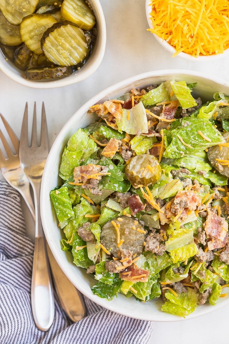 Mixed Big Mac salad on a bowl.