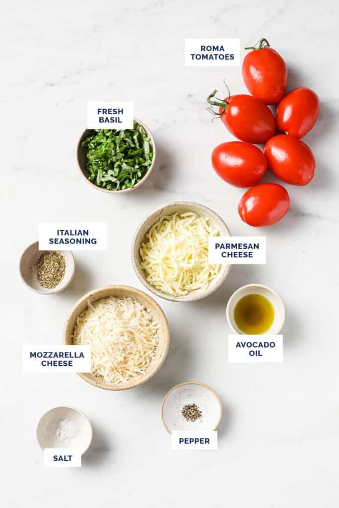 The ingredients needed to make baked tomatoes with Parmesan and mozzarella cheese.