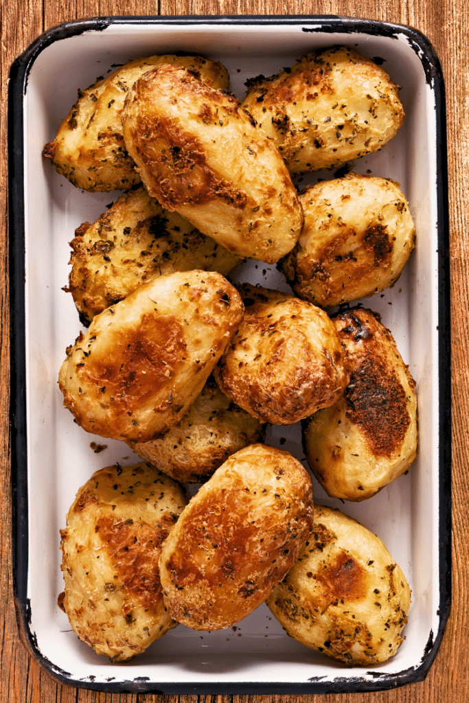 Baked potatoes in a baking dish.