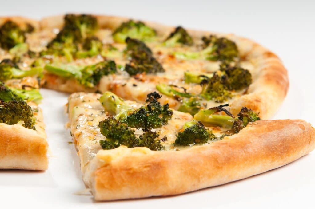 Broccoli on pizza.