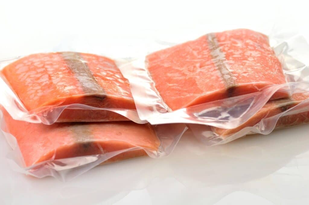 Sealed frozen salmon filets.