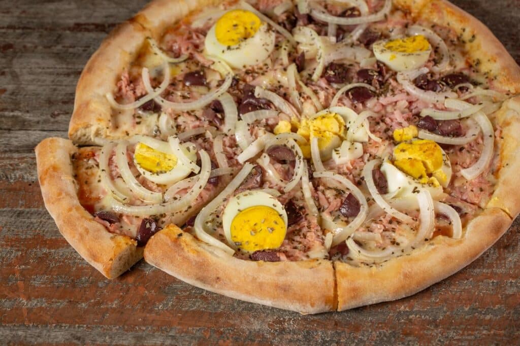 Hard-boiled egg on pizza.