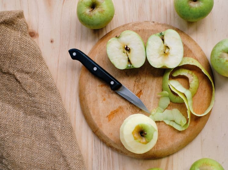 Close-up of golden apples with the peel removed