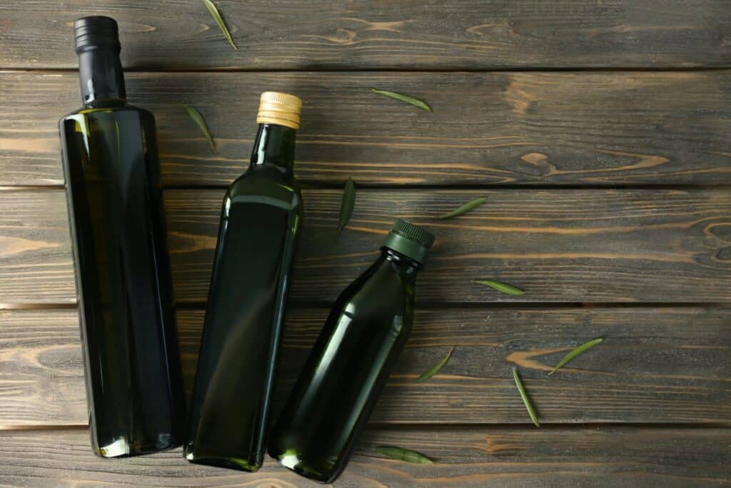 Three bottles of olive oil.