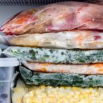 Stacked foods in a freezer.