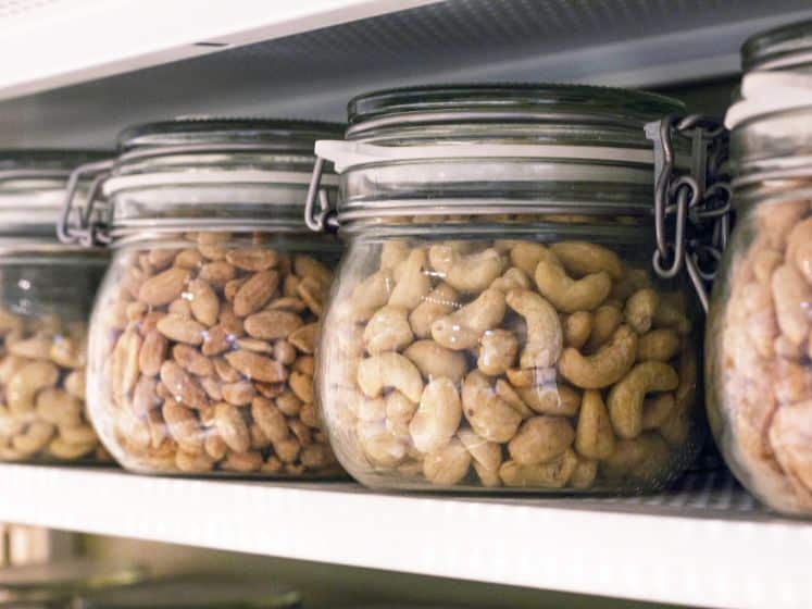 Glass storage containers of nuts.