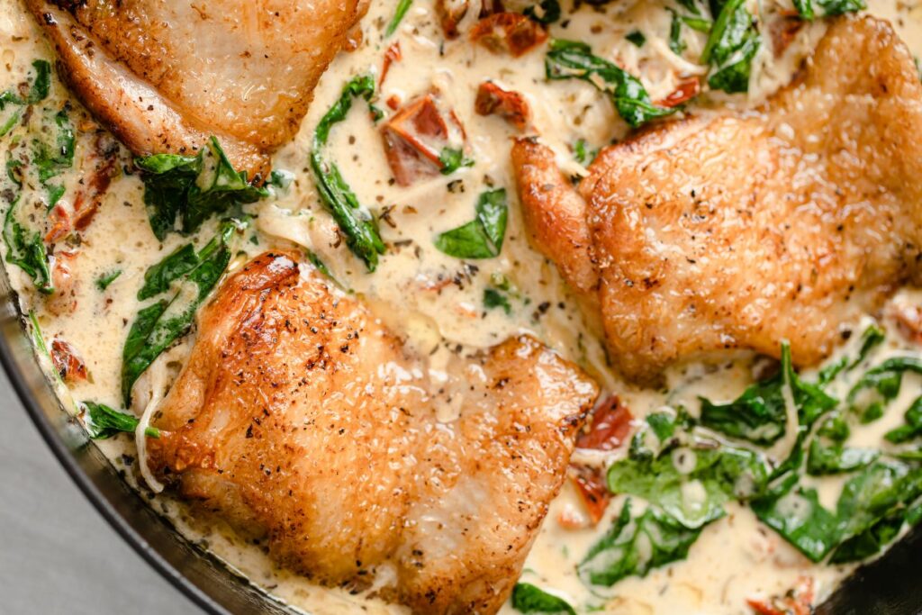 A skillet of creamy Tuscan chicken.