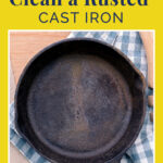 Pinterest graphic for the blog post: How to clean a rusted cast iron.