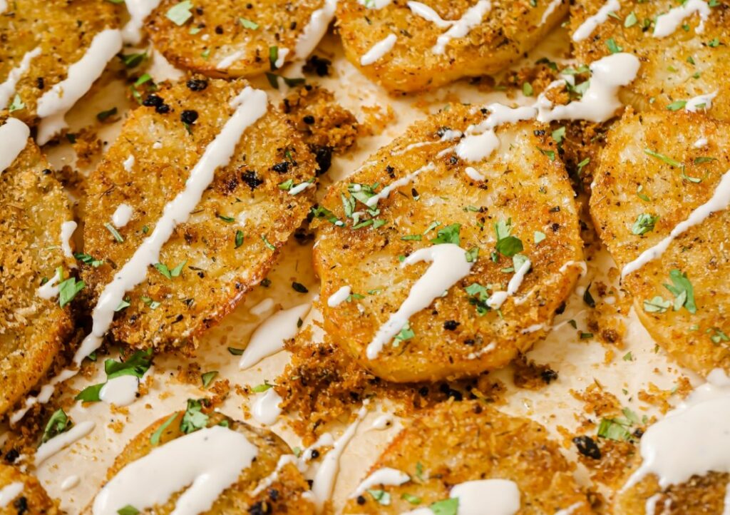 Garnished parmesan crusted potatoes.