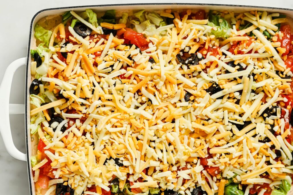 Taco dip in a baking pan.