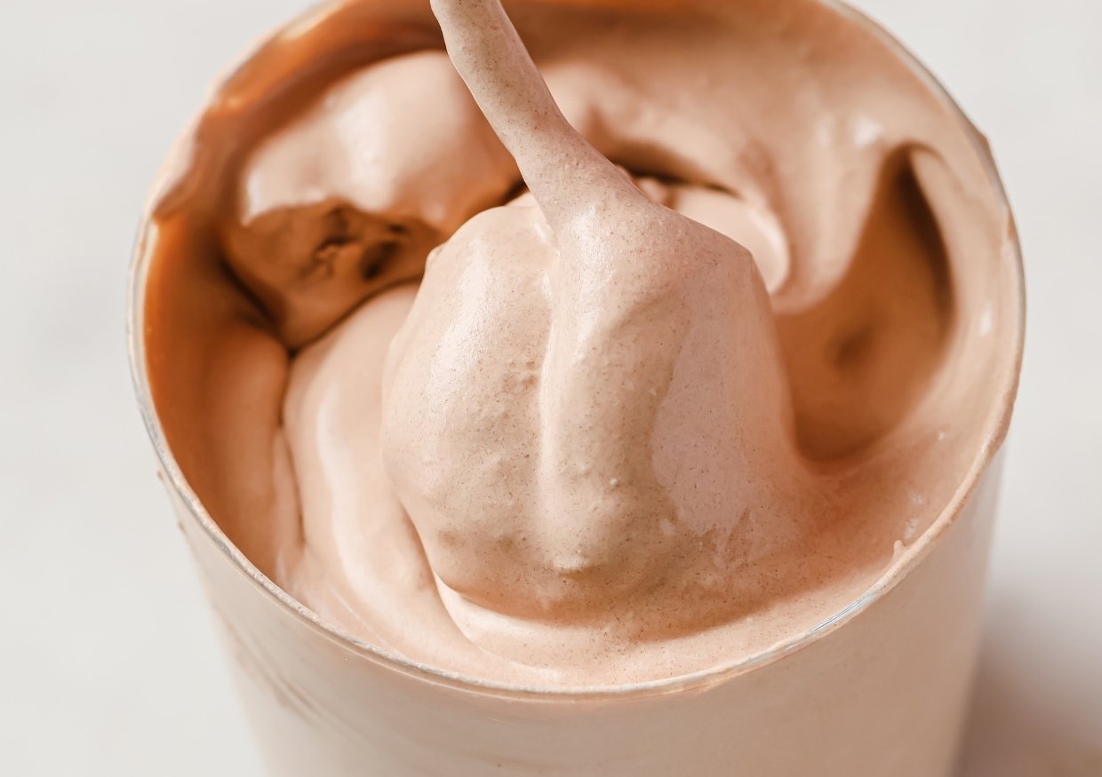 A glass of keto frosty on a countertop.