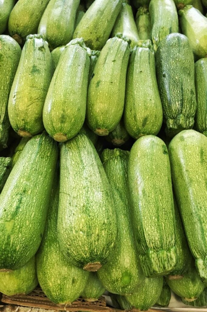 A pile of fresh zucchini.