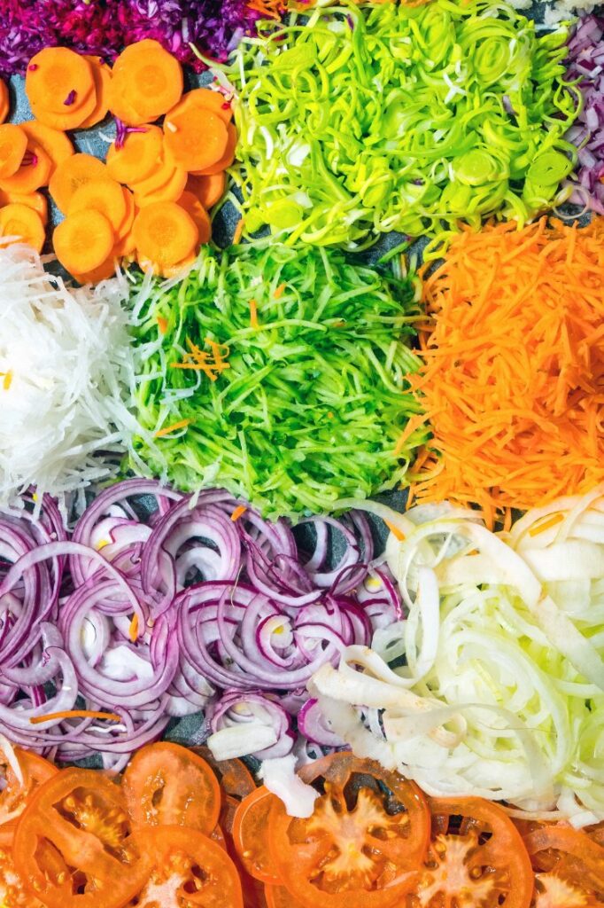 A variety of freshly chopped vegetables.