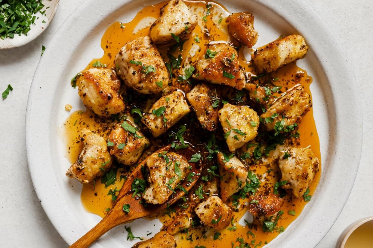 A plate of garlic butter chicken bites.