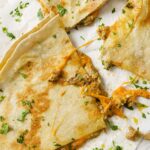 Garnished tuna melt quesadillas.