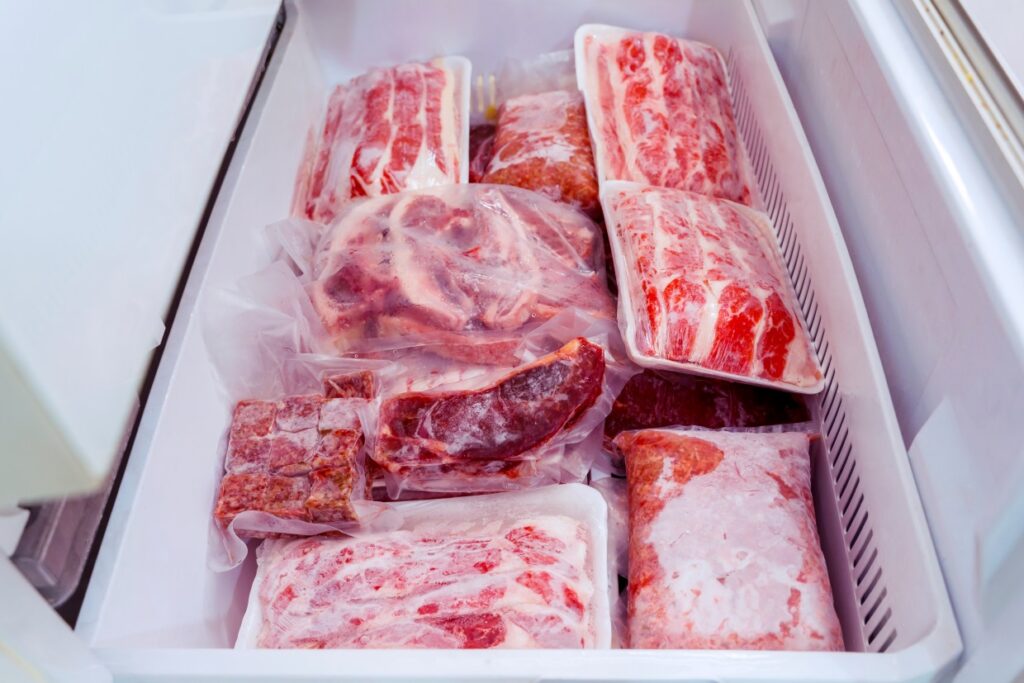 Frozen beef stored in a freezer.