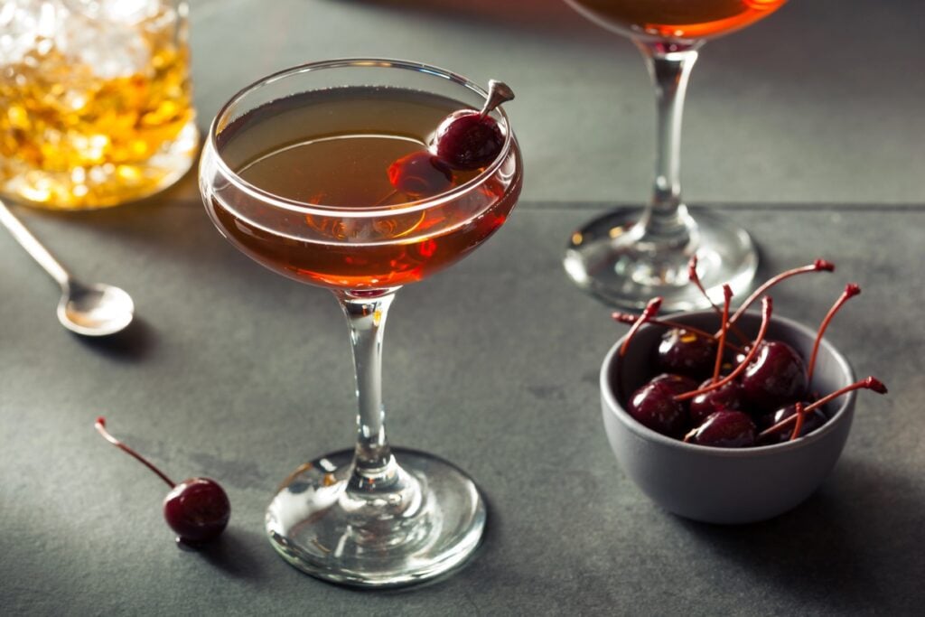 Manhattan cocktails with cherries.