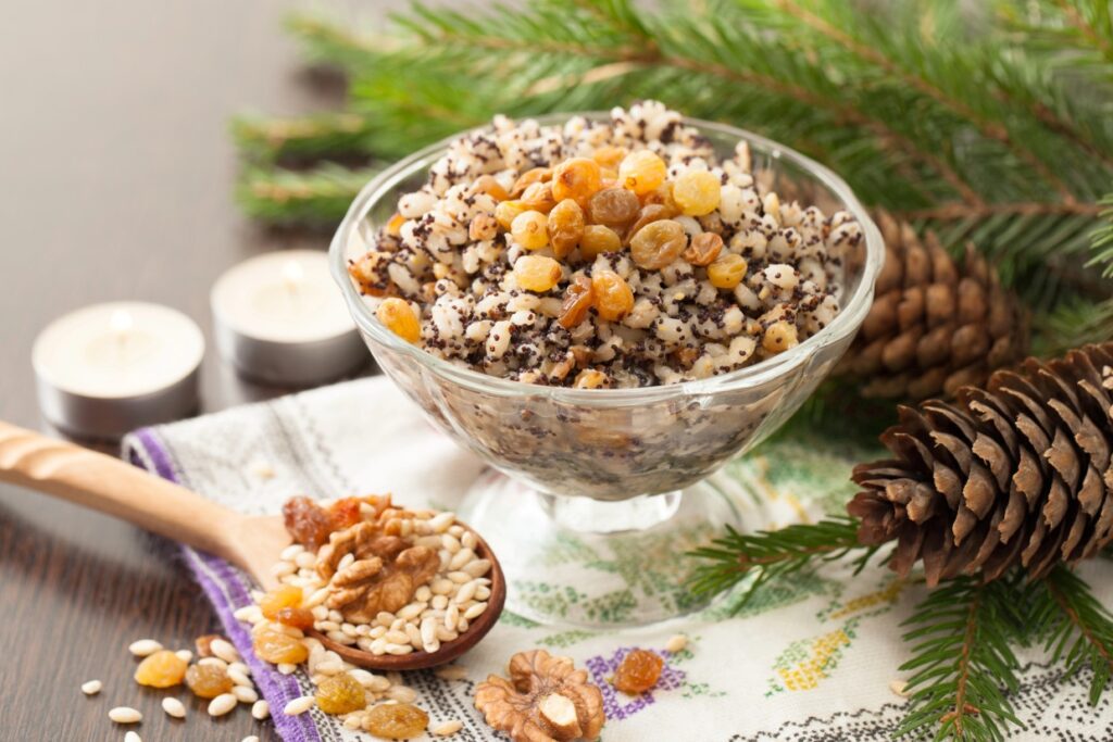 A bowl of whole grain Kutya topped with golden raisins.