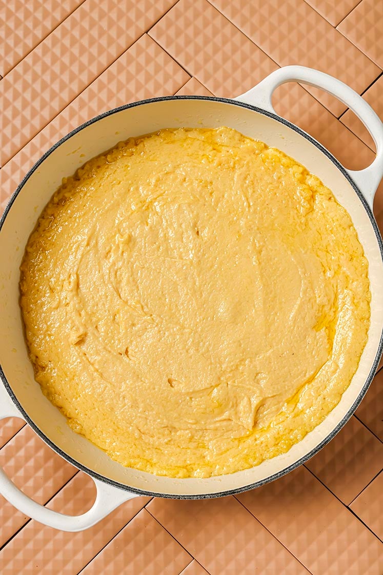 Honey butter skillet cornbread batter in a skilet.