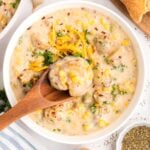 Spoonful of creamy corn and potato chowder.