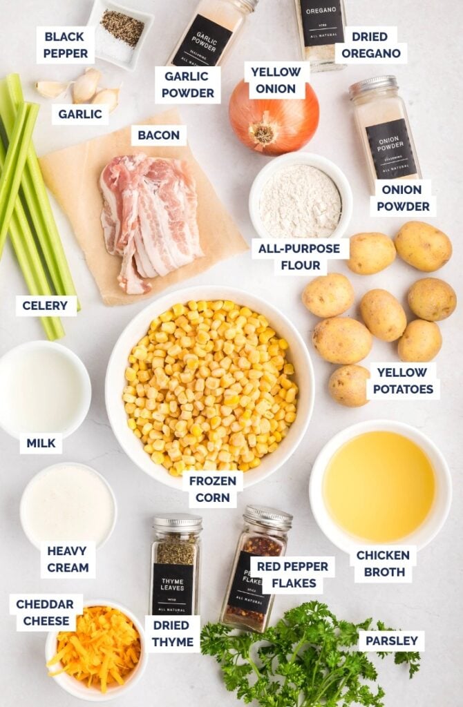 "Labeled ingredients for corn and potato chowder including corn, potatoes, bacon, onion, celery, garlic, cheese, milk, and broth.