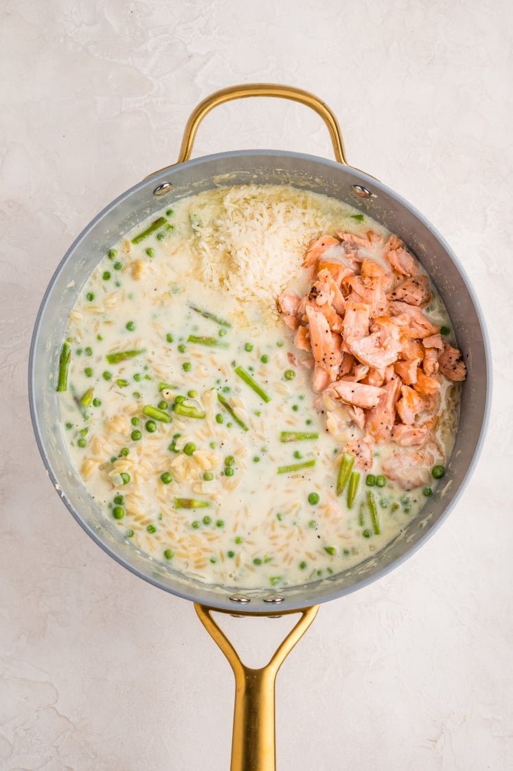 Salmon and cheese stirred into the orzo.