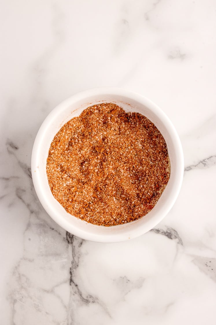 Small white bowl filled with a fully mixed brisket dry rub.