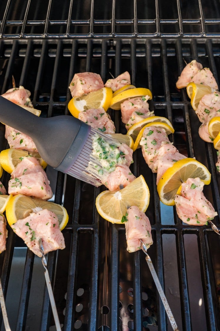 About halfway through cooking, brush the salmon with any extra lemon garlic mixture.