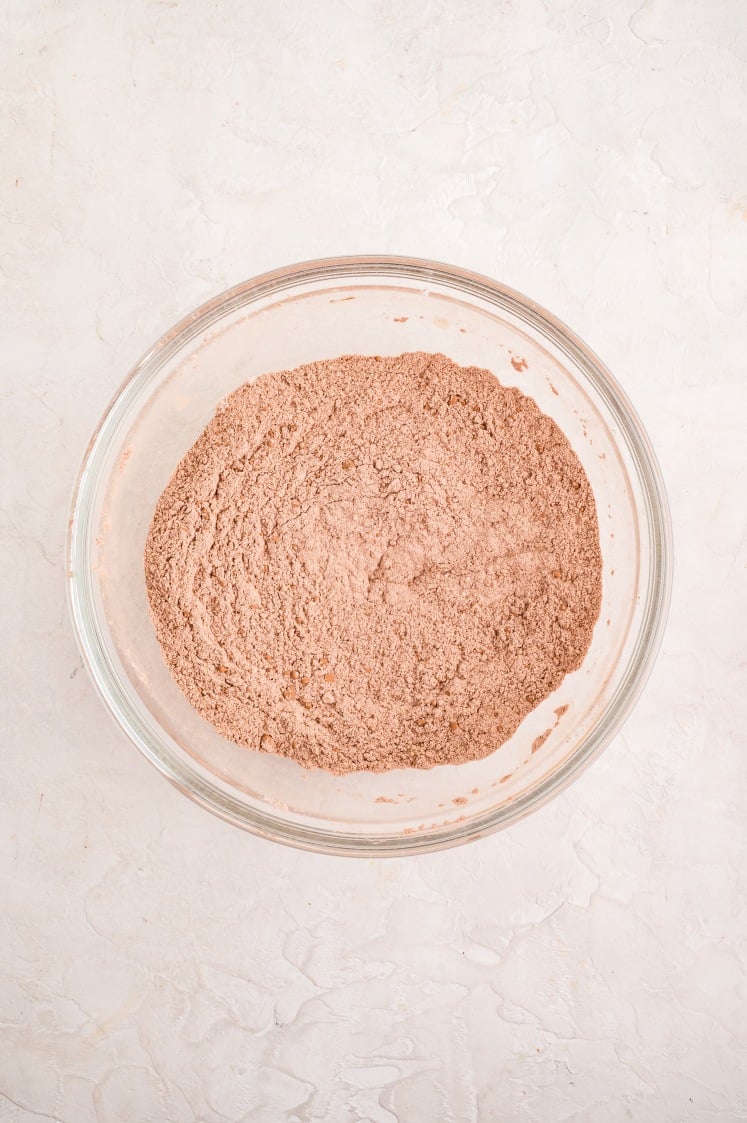 Dry ingredients fully whisked together until evenly combined and lump-free, ready to be folded into the brownie batter.