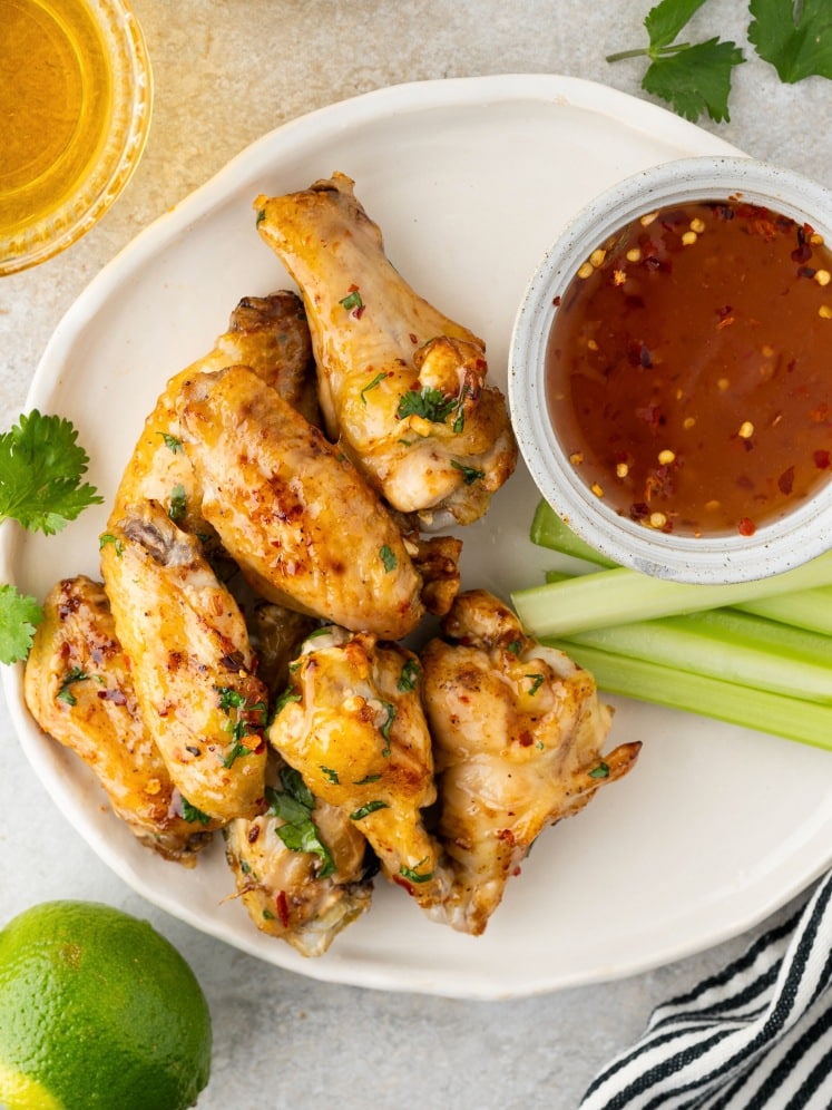 Air fryer chicken wings with sweet chili sauce.